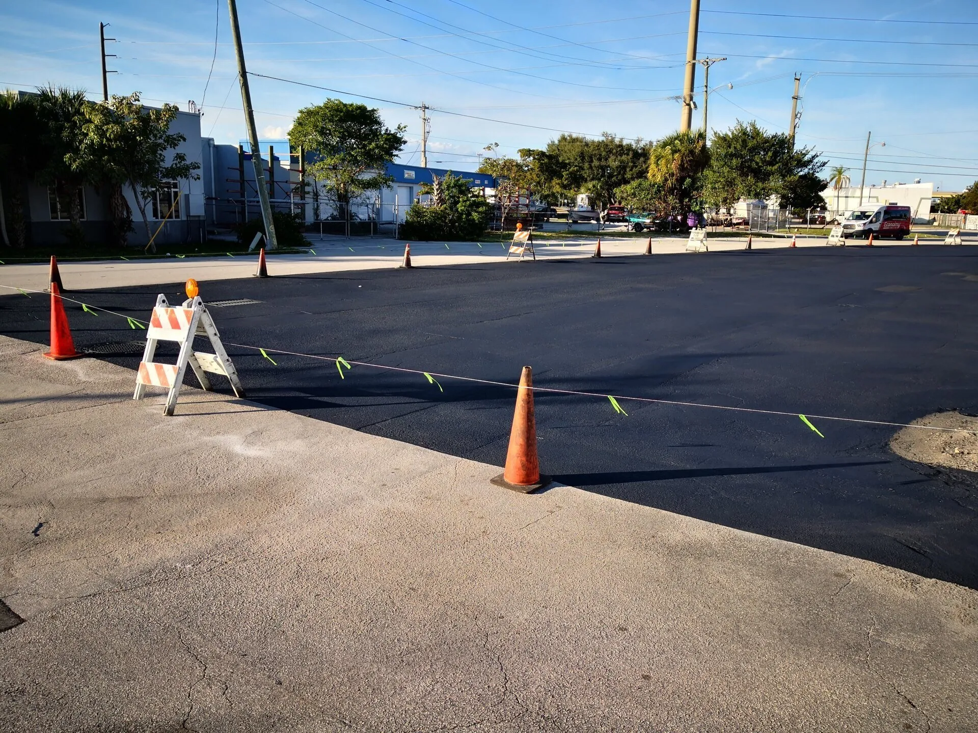 This sealed parking lot helps decrease the chance of long-term damage since the sealer protects the area from weather and water damage.